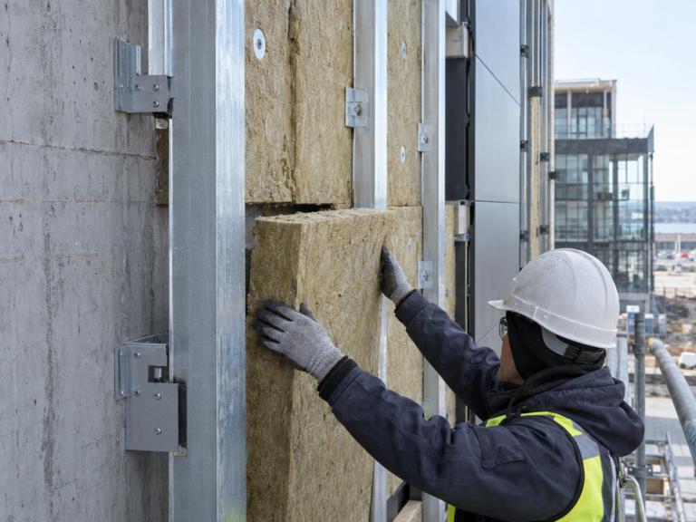 Installing stone wool boards on an exterior wall